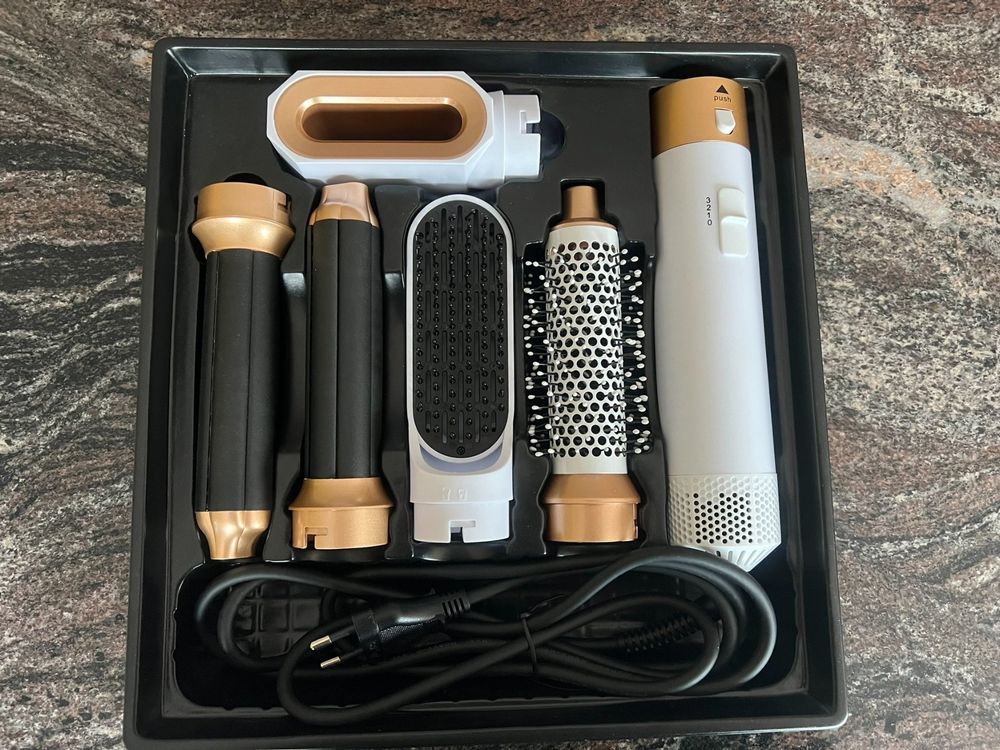 Sèche-cheveux multifonction 5-en-1 pour routine cheveux rapide et simplifiée
